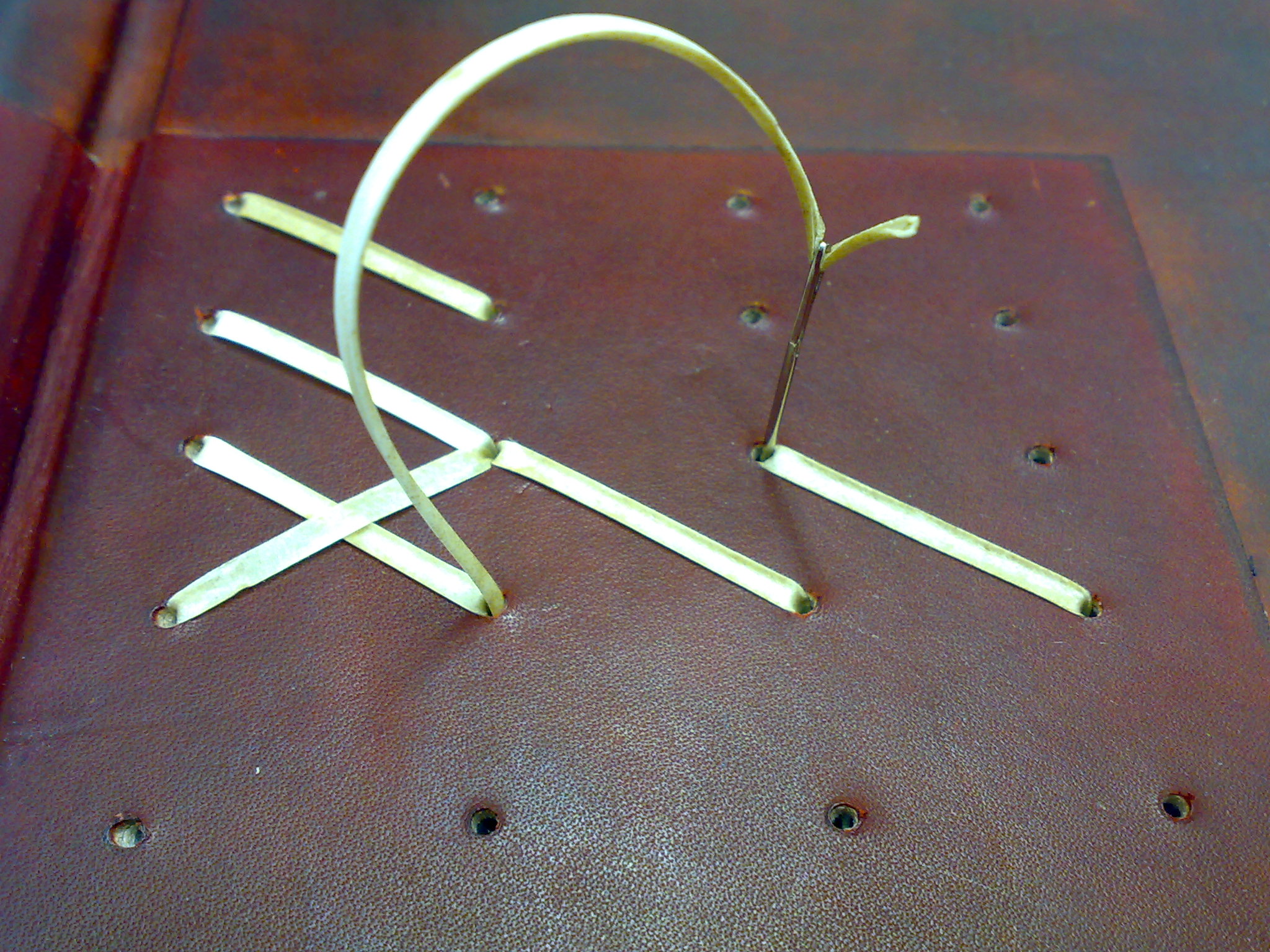  Lacing the vellum strip 